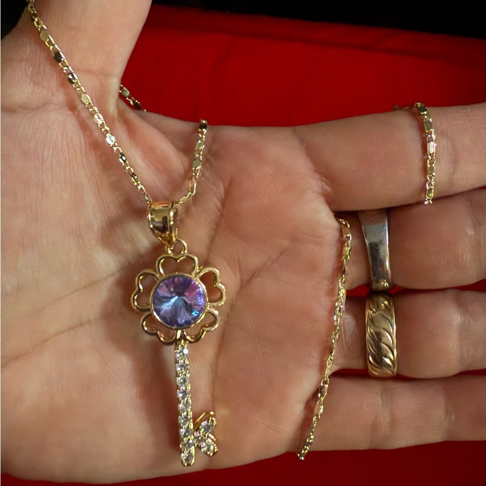 Gold Key Pendant Necklace with Purple Accent